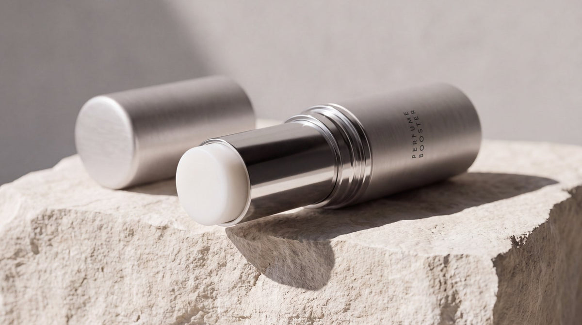 The Parfume Booster stick, opened, on a block of stone