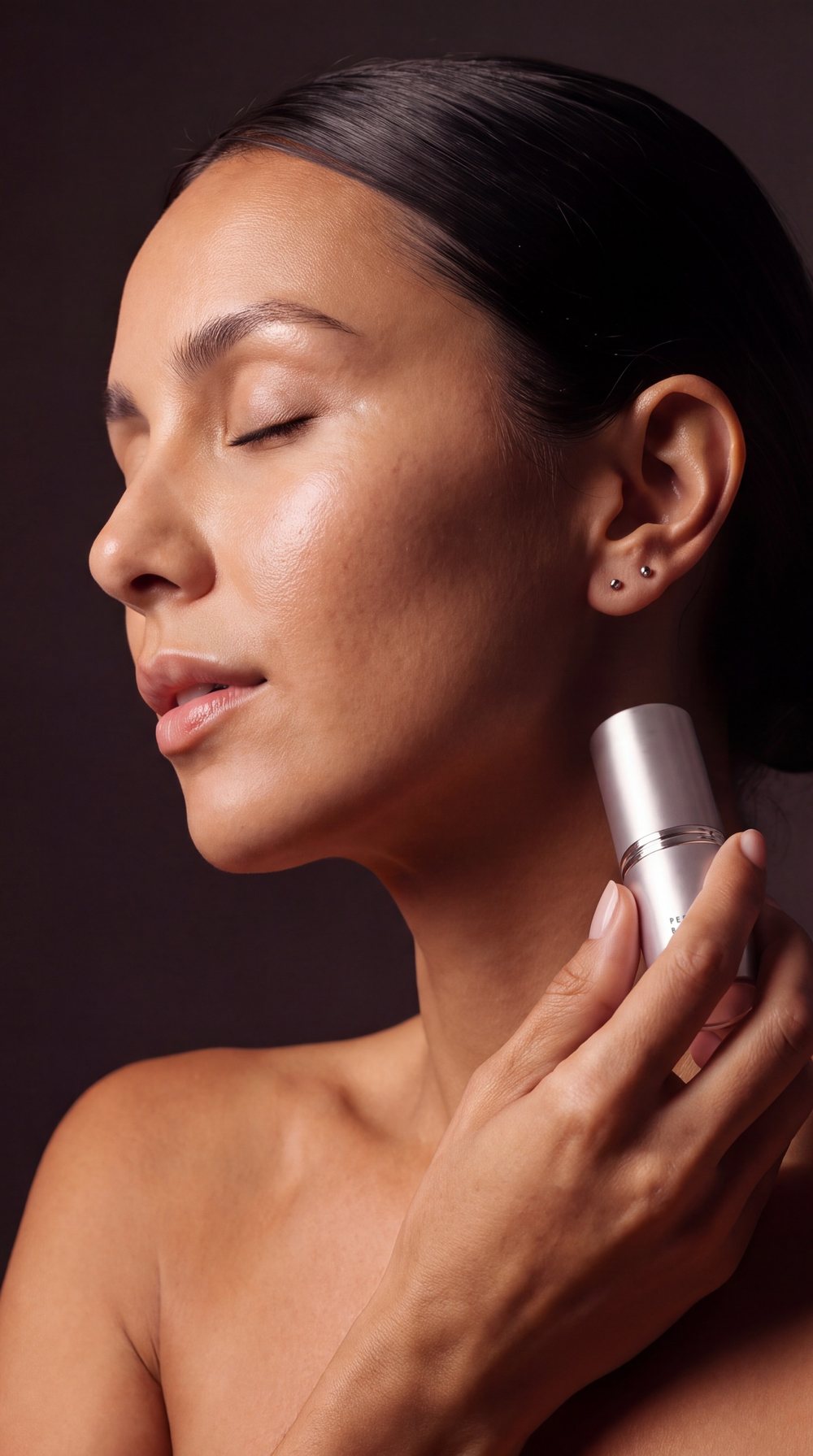 Woman swiping the Parfume Booster stick on her neck